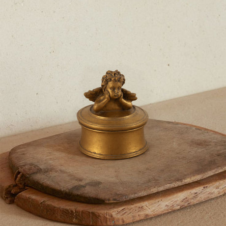 vintage gold round resin cherub trinket box