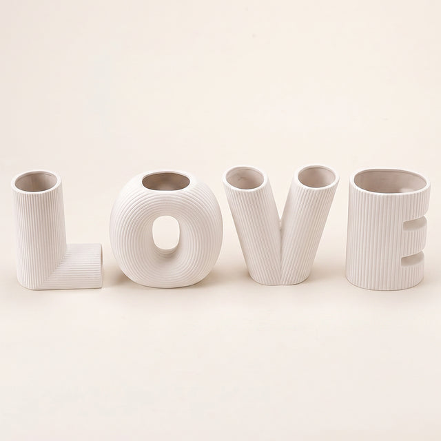 white LOVE letter vases straight on view