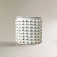 white cement dotted planter