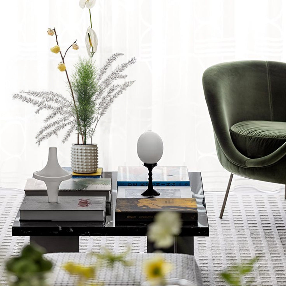 white cement dotted planter in the living room