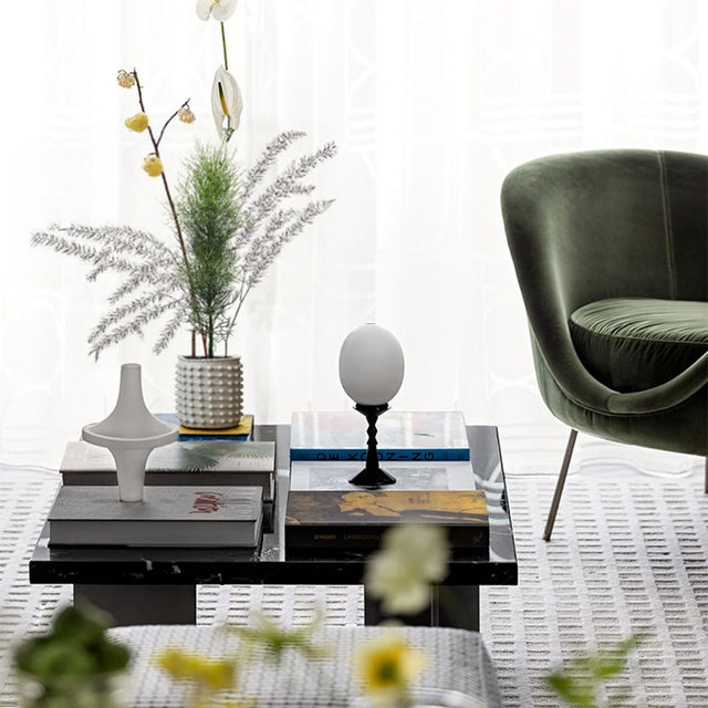 white cement dotted planter in the living room