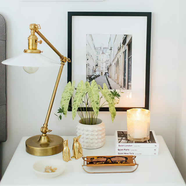 white cement dotted planter on the table