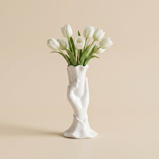 white ceramic hand vase with white tulips
