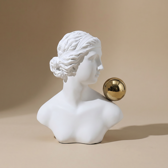 white classical bust sculpture with gold sphere