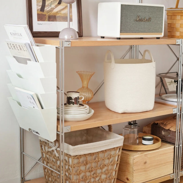 white laundry bakset on the shelf