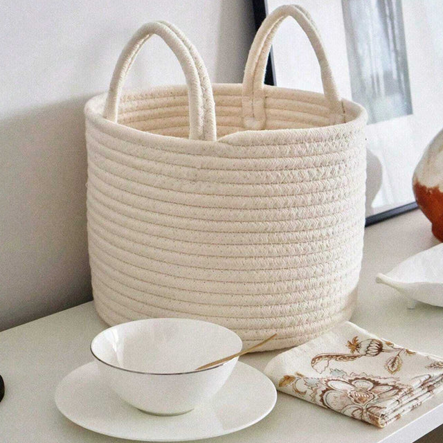 white laundry bakset on the table