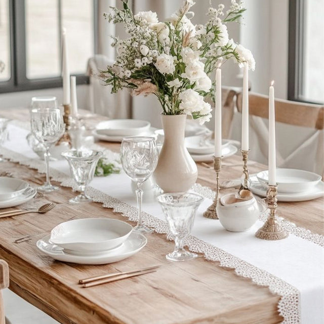 white satin lace table runner on a table