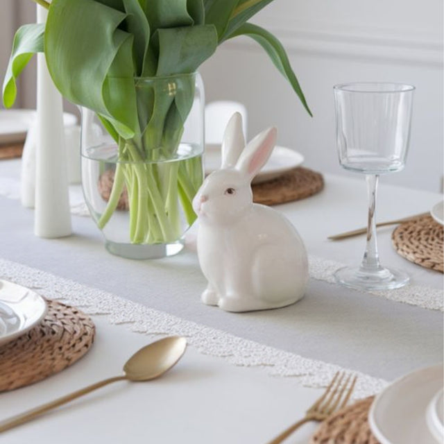 white satin lace table runner on the dinning table
