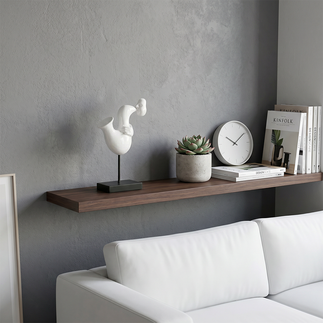 white saxophone sculpture on shelf with clock