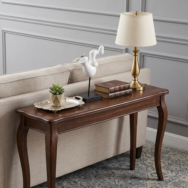 white saxophone sculpture on wooden console table