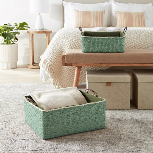 wicker storage basket filled with clothes