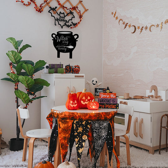 witch cauldron wooden wall hang black silhouette in dining room