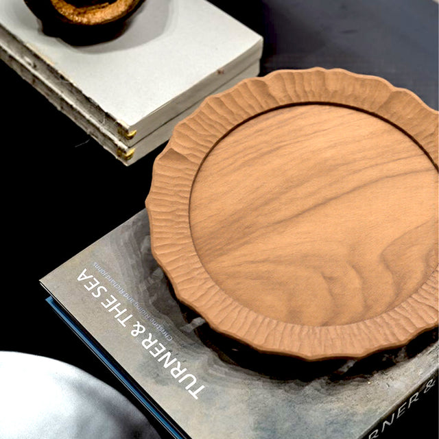 wood serving plate on the table