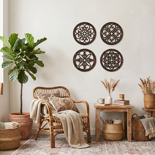 wood wall decor above rattan chair with pampas