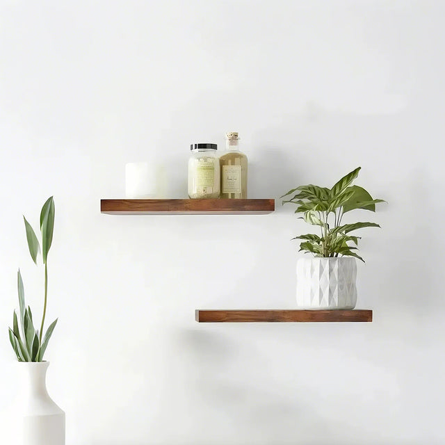 wooden floating shelf on the wall