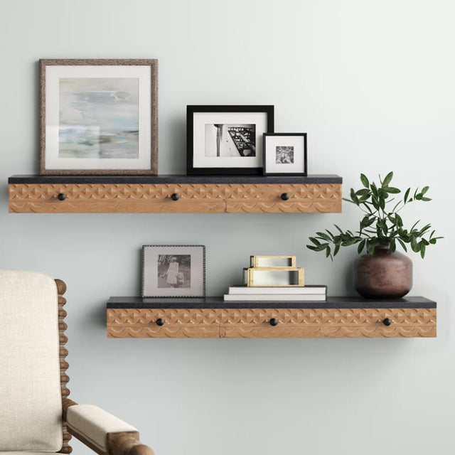 wooden floating wall shelf displaying picture frames