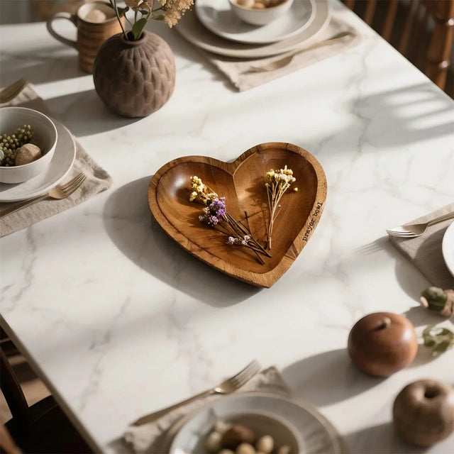 wooden prayer bowl holding dried flower