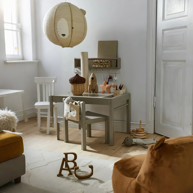 wooden star shaped decorative pen holder on the table