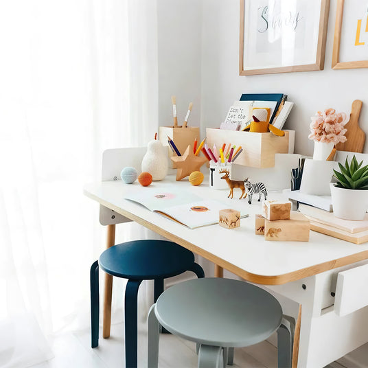 wooden star shaped decorative pen holder on the table