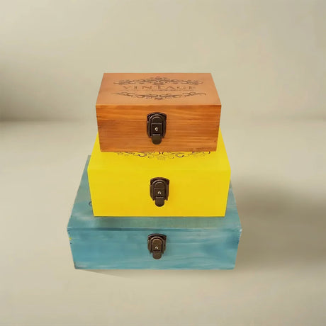 wooden storage box pile up on the table