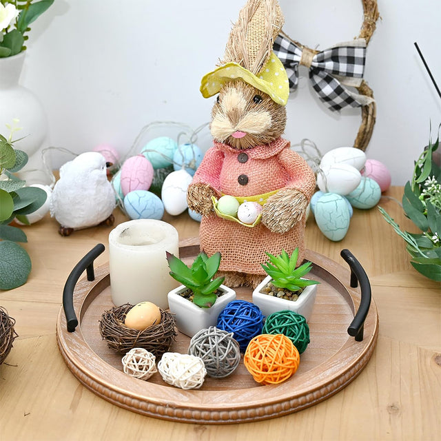 wooden tray displaying Easter eggs