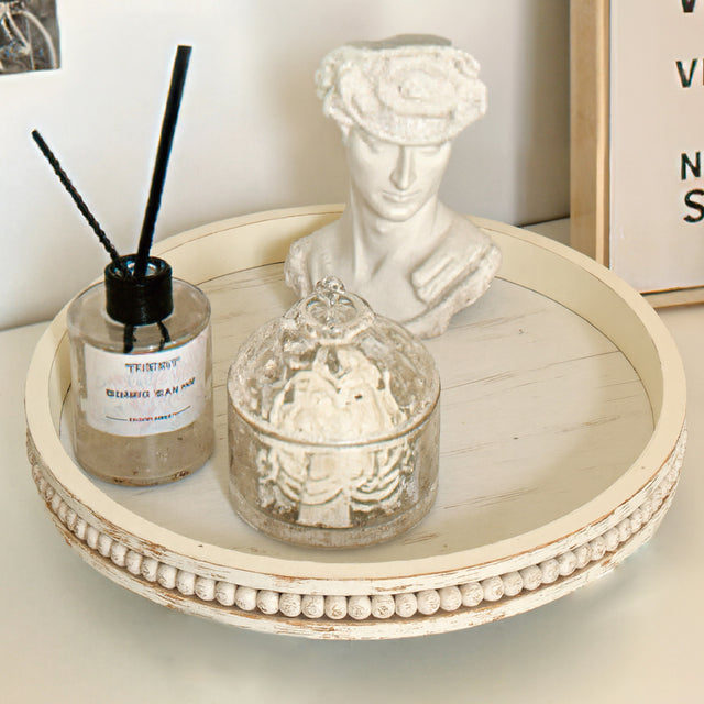 wooden tray holding decors