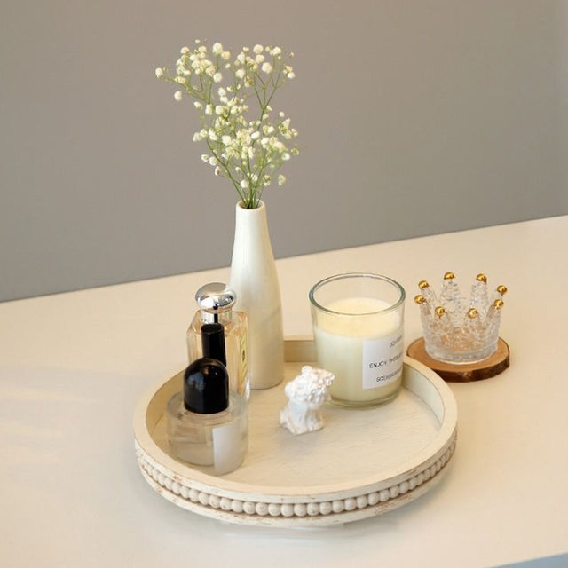 wooden tray holding decors