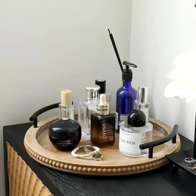 wooden tray holding skincare items