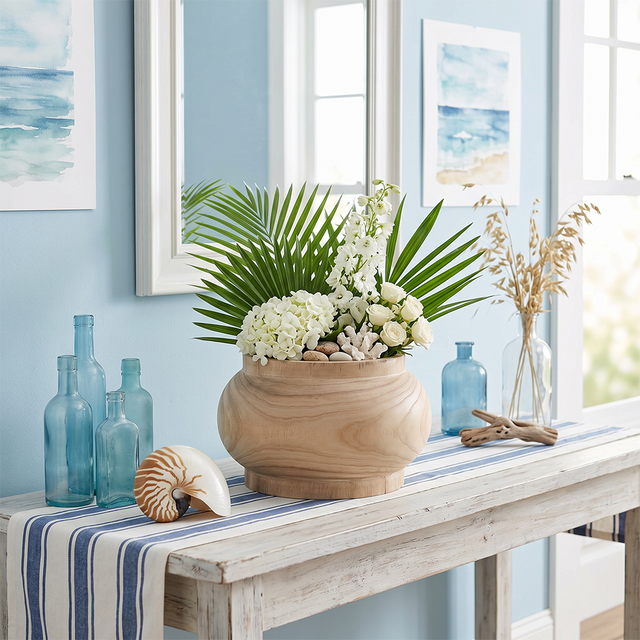 wooden vase with palms on coastal console