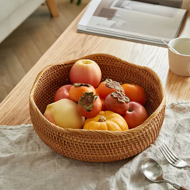 woven rattan brown round 3 piece storage basket on the table