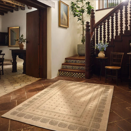 a khaki rug on the floor