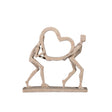 Abstract Couple Holding Heart Sculpture