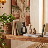 Abstract Figure Set On Wooden Shelf