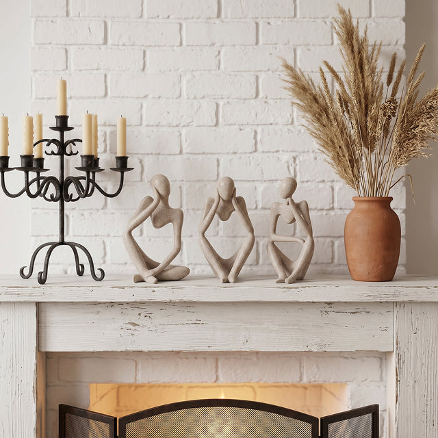 Abstract Thinker Set On Fireplace Mantel