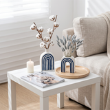 Arch ceramic decor on side table
