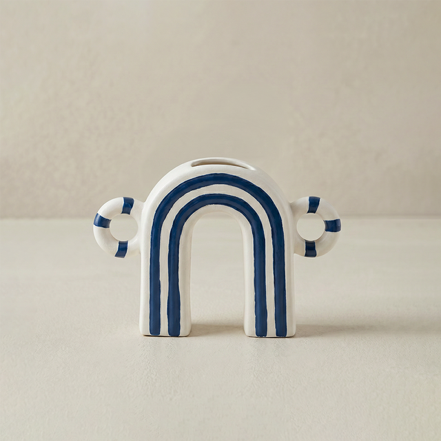Arch ceramic decor with side ornaments
