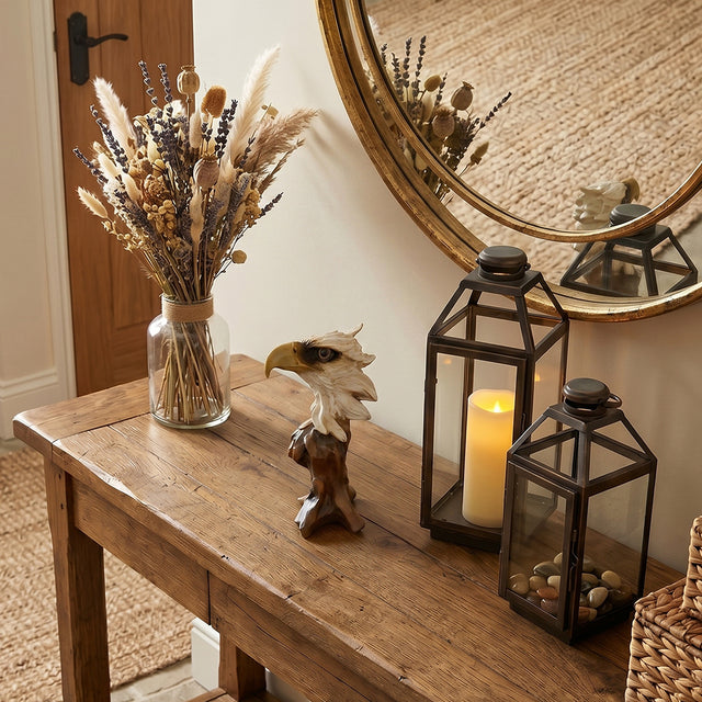 Bald eagle figurine on rustic entry wood table