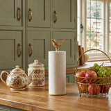 Bamboo towel holder on rustic farmhouse kitchen table