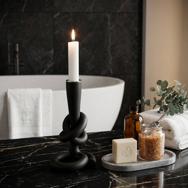 Black candlestick in bathroom space
