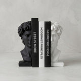 Black white david bust bookends with books