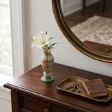 Blue vein stone vase on rustic entry console table