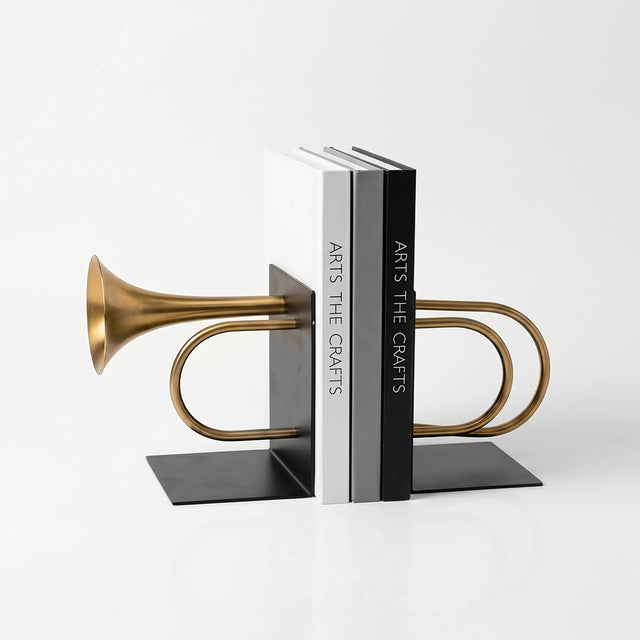 Brass trumpet shaped metal bookend set