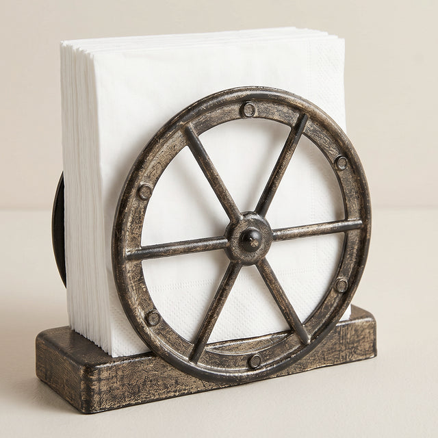 Brown Wagon Wheel With White Napkins