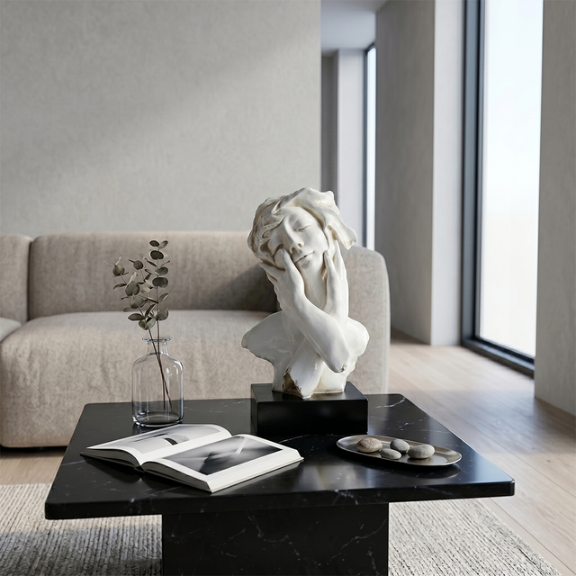 Bust sculpture on living room coffee table