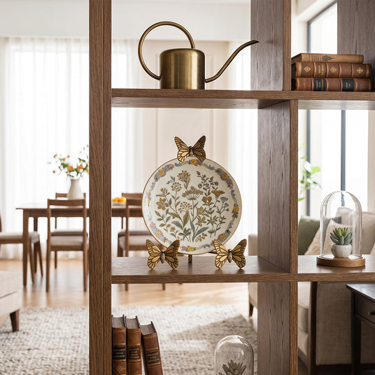 Butterfly plate stand inside open bookshelf