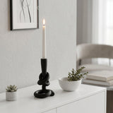Candle holder inside minimalist room
