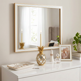 Candle ornament on white console
