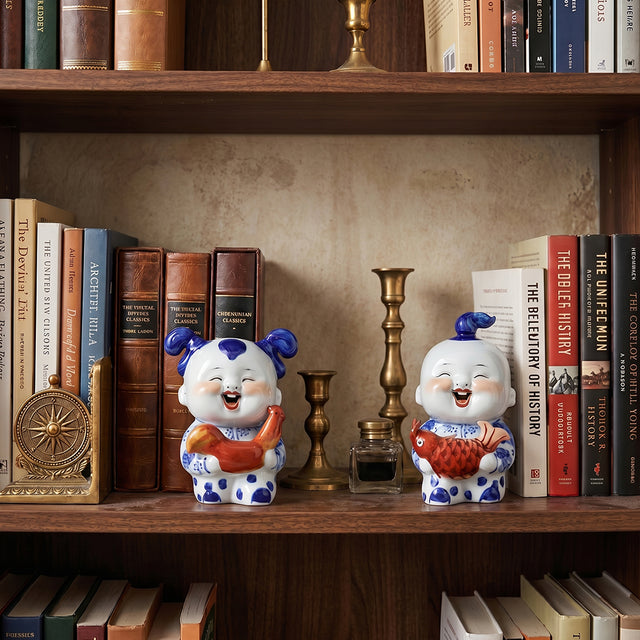 Ceramic pair displayed on wood bookshelf