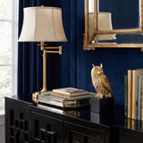 Checkered Owl Sculpture On Black Cabinet