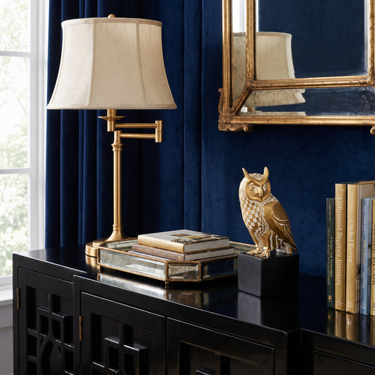 Checkered Owl Sculpture On Black Cabinet